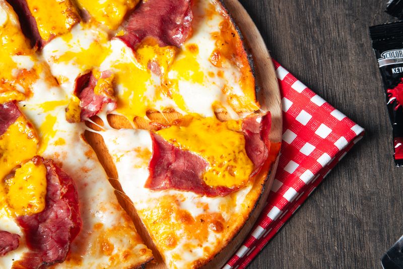 Hawaiian pizza with pineapple and ham