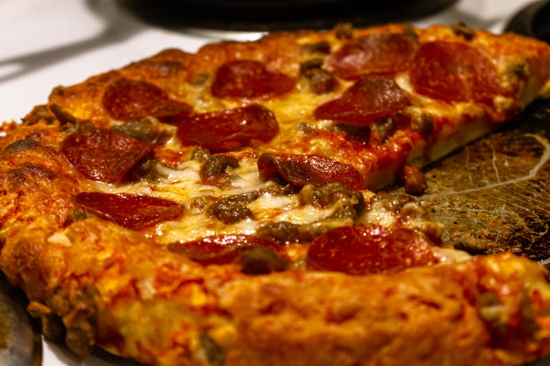 Creamy white ranch pizza with spinach and chicken